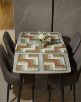A bird's-eye view of the entire dining set, demonstrating how the runner and mats provide full coverage and a polished aesthetic for the table.