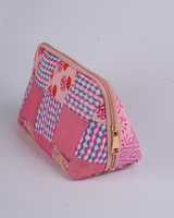 A side profile view showing the pouch’s wide-bottom, triangular structure that allows it to stand upright independently.