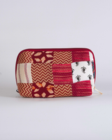 A straightforward horizontal view against a white background, highlighting the balanced distribution of the patterned textile blocks and the clean quilted texture.