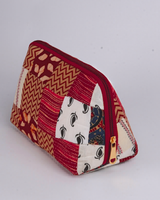 A side profile view showing the pouch’s wide-bottom, triangular structure that allows it to stand upright independently.