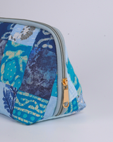 A side profile view showing the pouch’s triangular, wide-bottom structure that allows it to stand upright independently.