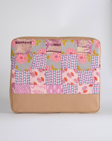 Front view of the Pink Chevron & Floral quilted laptop bag, highlighting the mix of blush pink floral prints and grey chevron patterns with a tan bottom panel.